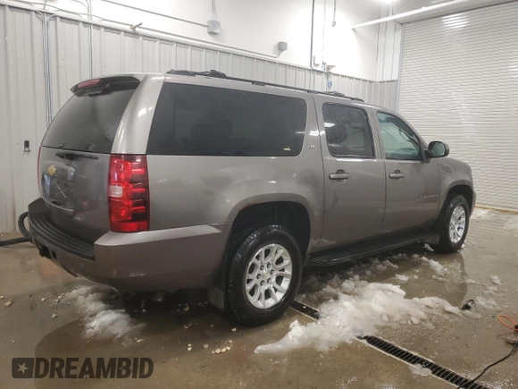 2013 Chevrolet Suburban LT with VIN 1GNSKJE72DR236026, listed as a Copart auction lot 86153104 with 222,417 mi miles and Salvage title. Bid and sale history available at DreamBid. Image 3.