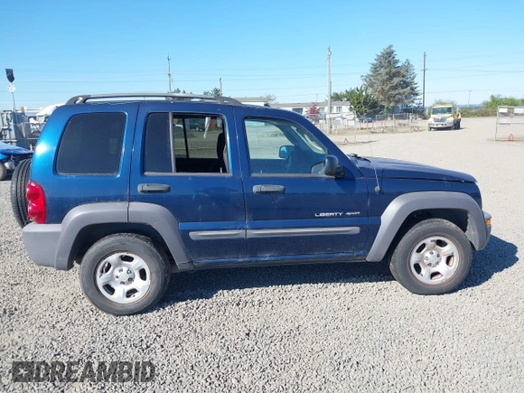 2003 Jeep Liberty Sport with VIN 1J4GL48K83W663248, listed as a IAAI auction lot 42056561 with 161,652 mi miles. Bid and sale history available at carsss.com. Image 13.