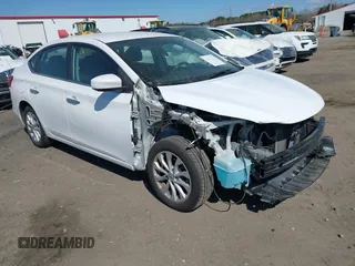2019 Nissan Sentra S z VIN 3N1AB7APXKY433274, wystawiony jako IAAI lot #41864649 z przebiegiem 89 722 mil mil oraz . Historia ofert i sprzedaży dostępna na DreamBid. Obrazek 1.