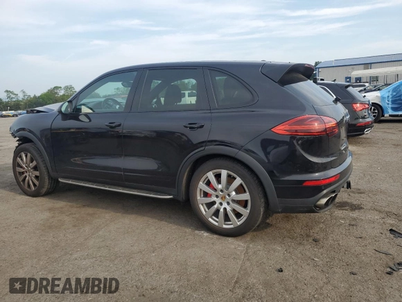 2015 Porsche Cayenne Turbo with VIN WP1AC2A28FLA82086, listed as a Copart auction lot 59860125 with 113,414 mi miles and Salvage title. Bid and sale history available at DreamBid. Image 2.