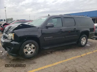 2011 Chevrolet Suburban z VIN 1GNSKHE33BR215592, wystawiony jako Copart lot #73824354 z przebiegiem 230 778 mil mil oraz Czysty tytuł • Clean title. Historia ofert i sprzedaży dostępna na DreamBid. Obrazek 1.