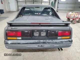 1989 Toyota MR2 z VIN JT2AW15C1K0150268, wystawiony jako Copart lot #86257134 z przebiegiem 93 969 mil mil oraz Tytuł czysty. Historia ofert i sprzedaży dostępna na DreamBid. Obrazek 6.