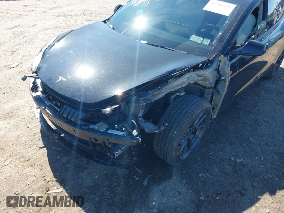 2023 Tesla Model 3 Long Range with VIN 5YJ3E1EB1PF632595, listed as a IAAI auction lot 41754131 with 8,147 mi miles and . Bid and sale history available at DreamBid. Image 6.