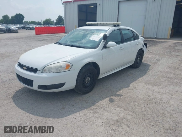 2013 Chevrolet Impala Police z VIN 2G1WD5E35D1166015, wystawiony jako IAAI lot #42171708 z przebiegiem 169 790 mil mil oraz . Historia ofert i sprzedaży dostępna na DreamBid. Obrazek 2.