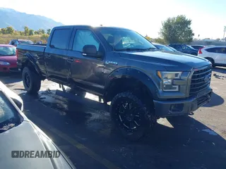 2015 Ford F-150 XLT with VIN 1FTFW1EF9FKD48453, listed as a IAAI auction lot 40694465 with 129,707 mi miles and . Bid and sale history available at carsss.com. Image 1.