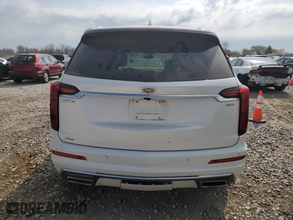 2022 Cadillac XT6 Premium Luxury with VIN 1GYKPDRS0NZ117512, listed as a Copart auction lot 53599905 with 47,066 mi miles and Salvage Title. Bid and sale history available at carsss.com. Image 6.