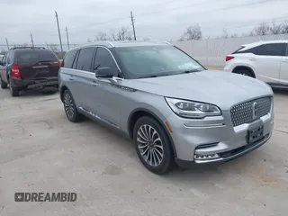 2022 Lincoln Aviator Reserve z VIN 5LM5J7WC3NGL22118, wystawiony jako IAAI lot #41621910 z przebiegiem 81 245 mil mil oraz . Historia ofert i sprzedaży dostępna na DreamBid. Obrazek 1.