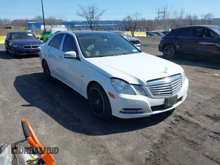 2012 Mercedes-Benz E-Class E 350 Luxury with VIN WDDHF8JB4CA651569, listed as a IAAI auction lot 41769849 with 150,074 mi miles. Bid and sale history available at carsss.com. Image 1.
