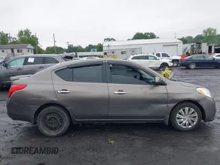 2013 Nissan Versa S with VIN 3N1CN7AP9DL861143, listed as a IAAI auction lot 42538137 with 249,439 mi miles and . Bid and sale history available at DreamBid. Image 13.