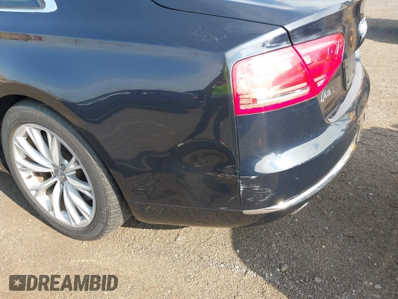 2011 Audi A8 with VIN WAURVAFD4BN018884, listed as a IAAI auction lot 42693000 with 116,952 mi miles and . Bid and sale history available at DreamBid. Image 13.