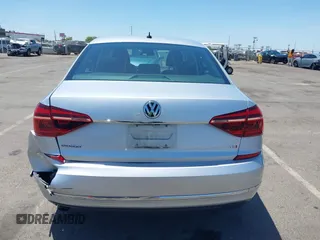 2017 Volkswagen Passat S with VIN 1VWAT7A32HC009657, listed as a IAAI auction lot 42541472 with 100,026 mi miles and . Bid and sale history available at DreamBid. Image 16.