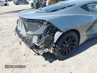 2024 Chevrolet Corvette 2LT z VIN 1G1YB2D43R5105307, wystawiony jako IAAI lot #42060470 z przebiegiem 9400 mil mil oraz . Historia ofert i sprzedaży dostępna na DreamBid. Obrazek 19.