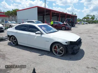 2014 BMW 5 Series 535i xDrive with VIN WBA5B3C56ED536747, listed as a IAAI auction lot 41900220 with 132,757 mi miles and . Bid and sale history available at carsss.com. Image 1.