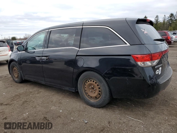 2015 Honda Odyssey Touring Elite with VIN 5FNRL5H91FB504095, listed as a Copart auction lot 53868125 with 176,272 mi miles and Salvage Title. Bid and sale history available at DreamBid. Image 2.