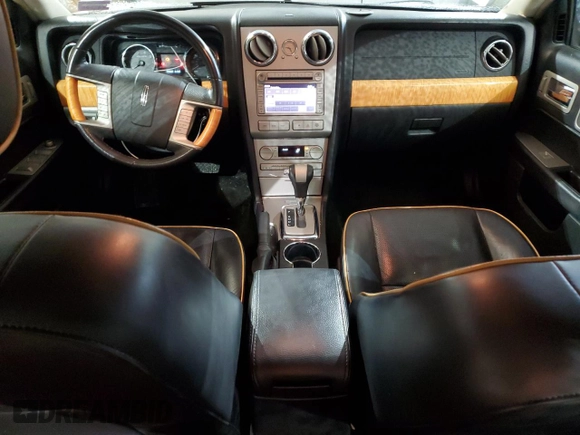 2009 Lincoln MKZ z VIN 3LNHM28T79R629555, wystawiony jako Copart lot #43765295 z przebiegiem 159 033 mil mil oraz Szkoda całkowita • Salvage title. Historia ofert i sprzedaży dostępna na DreamBid. Obrazek 8.