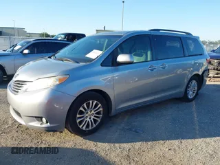2015 Toyota Sienna XLE with VIN 5TDYK3DC9FS610925, listed as a IAAI auction lot 42022267 with 153,997 mi miles. Bid and sale history available at carsss.com. Image 17.