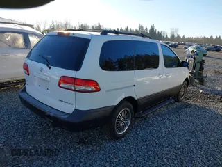 2001 Toyota Sienna CE with VIN 4T3ZF19C91U335568, listed as a IAAI auction lot 41534274 with 179,397 mi miles. Bid and sale history available at carsss.com. Image 4.