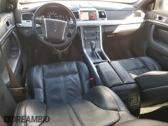 2011 Lincoln MKS EcoBoost with VIN 1LNHL9FT7BG611097, listed as a Copart auction lot 48180885 with 140,262 mi miles and Salvage title. Bid and sale history available at DreamBid. Image 8.