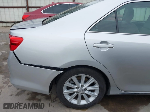 2014 Toyota Camry SE with VIN 4T1BK1FK7EU540975, listed as a IAAI auction lot 41673926 with 190,036 mi miles. Bid and sale history available at carsss.com. Image 18.