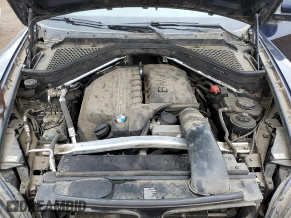 2012 BMW X6 35i z VIN 5UXFG2C55CL780183, wystawiony jako Copart lot #57357295 z przebiegiem 173 748 mil mil oraz Czysty tytuł • Clean title. Historia ofert i sprzedaży dostępna na DreamBid. Obrazek 12.