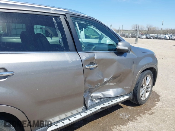 2015 Kia Sorento SX with VIN 5XYKWDA74FG591902, listed as a IAAI auction lot 41856991 with 128,471 mi miles. Bid and sale history available at carsss.com. Image 6.
