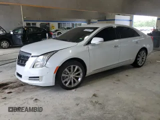 2016 Cadillac XTS Luxury Collection with VIN 2G61M5S38G9132374, listed as a Copart auction lot 60655875 with 158,199 mi miles and Salvage title. Bid and sale history available at DreamBid. Image 1.