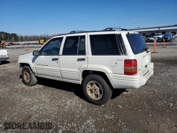 1998 Jeep Grand Cherokee Limited with VIN 1J4GZ78Y0WC307578, listed as a Copart auction lot 45272765 with 328,264 mi miles and Salvage title. Bid and sale history available at DreamBid. Image 2.
