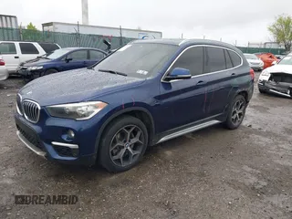 2019 BMW X1 sDrive28i with VIN WBXHU7C5XK5L10933, listed as a IAAI auction lot 41931162 with 55,308 mi miles. Bid and sale history available at carsss.com. Image 2.