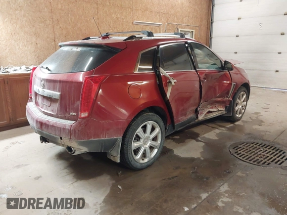 2015 Cadillac SRX Premium Collection with VIN 3GYFNGE34FS629506, listed as a IAAI auction lot 41380586 with 186,672 mi miles. Bid and sale history available at carsss.com. Image 4.