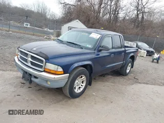 2003 Dodge Dakota SLT with VIN 1D7HL48X23S261258, listed as a IAAI auction lot 41362485 with 143,397 mi miles. Bid and sale history available at carsss.com. Image 2.