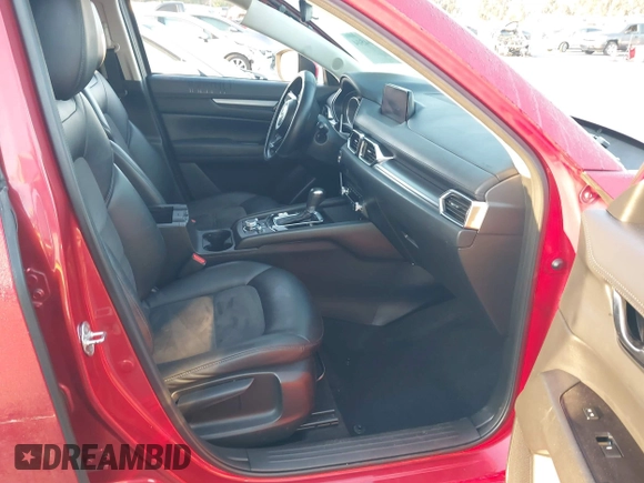 2020 Mazda CX-5 Touring z VIN JM3KFACM1L0855474, wystawiony jako IAAI lot #42004504 z przebiegiem 82 505 mil mil oraz . Historia ofert i sprzedaży dostępna na DreamBid. Obrazek 5.