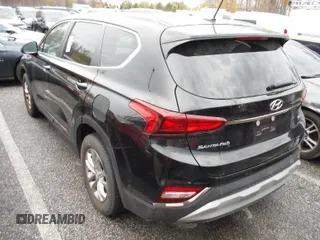 2019 Hyundai Santa Fe SE with VIN 5NMS2CADXKH097782, listed as a IAAI auction lot 42679125 with 122,085 mi miles and . Bid and sale history available at DreamBid. Image 1.