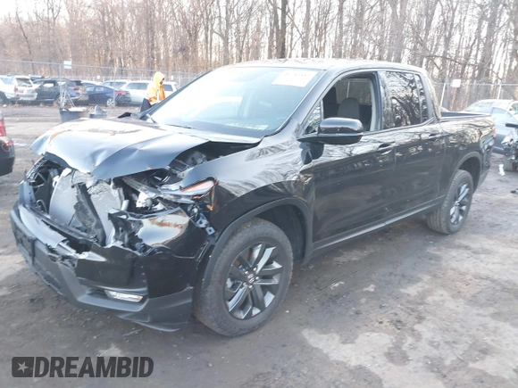 2024 Honda Ridgeline Sport with VIN 5FPYK3F14RB012334, listed as a IAAI auction lot 41542412 with 1,817 mi miles and . Bid and sale history available at DreamBid. Image 2.