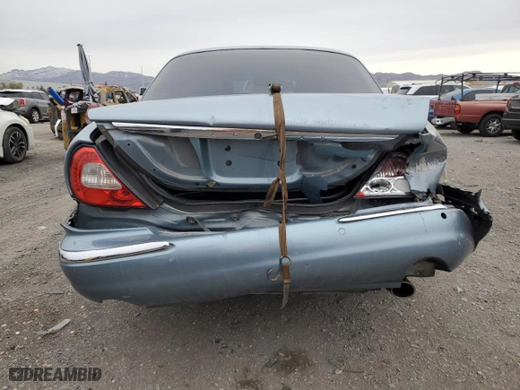 2005 Jaguar XJ with VIN SAJWA79CX5SG35319, listed as a Copart auction lot 49321465 with 182,834 mi miles and Salvage Title. Bid and sale history available at carsss.com. Image 6.