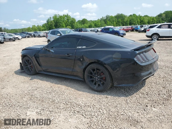 2016 Ford Mustang GT with VIN 1FA6P8CFXG5326279, listed as a Copart auction lot 59100565 with 52,972 mi miles and Salvage title. Bid and sale history available at DreamBid. Image 2.
