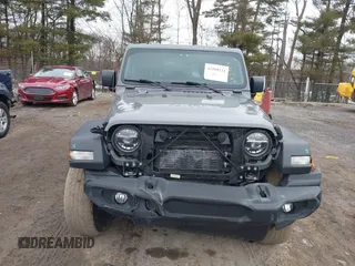 2021 Jeep Wrangler Unlimited Sport Altitude with VIN 1C4HJXDG1MW603784, listed as a IAAI auction lot 41509231 with 102,567 mi miles and . Bid and sale history available at DreamBid. Image 13.