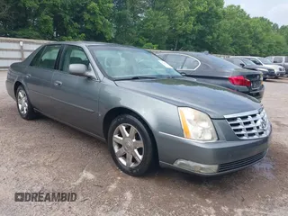 2006 Cadillac DTS 1SC z VIN 1G6KD57Y76U244707, wystawiony jako IAAI lot #42445115 z przebiegiem 189 119 mil mil oraz . Historia ofert i sprzedaży dostępna na DreamBid. Obrazek 1.