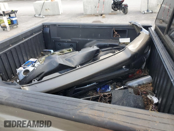 2011 Toyota Tacoma with VIN 3TMLU4EN6BM070132, listed as a Copart auction lot 56536564 with 185,256 mi miles and Salvage Title. Bid and sale history available at DreamBid. Image 12.