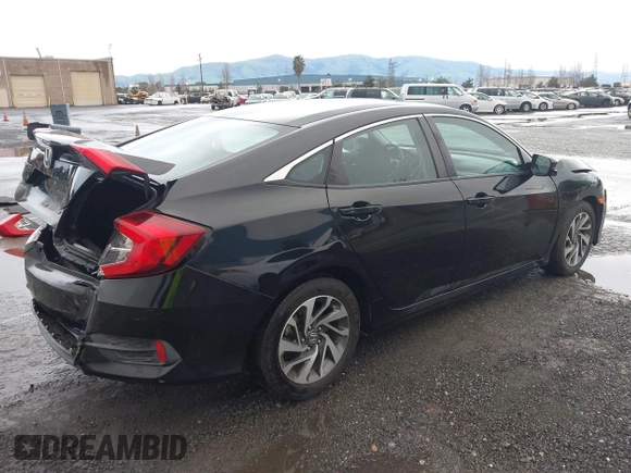 2016 Honda Civic EX with VIN 2HGFC2F70GH551151, listed as a IAAI auction lot 41795882 with 93,597 mi miles and . Bid and sale history available at DreamBid. Image 4.
