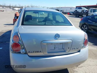 2003 Nissan Altima S with VIN 1N4AL11D63C321486, listed as a IAAI auction lot 41581386 with 200,082 mi miles. Bid and sale history available at carsss.com. Image 16.