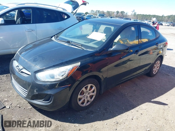 2012 Hyundai Accent GLS with VIN KMHCT4AE3CU265199, listed as a IAAI auction lot 41826958 with 121,618 mi miles. Bid and sale history available at carsss.com. Image 17.