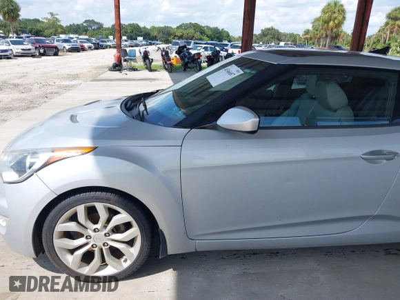 2012 Hyundai Veloster w/Gray Int z VIN KMHTC6ADXCU056898, wystawiony jako IAAI lot #40366687 z przebiegiem 137 161 mil mil oraz . Historia ofert i sprzedaży dostępna na DreamBid. Obrazek 15.