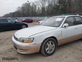 1996 Lexus ES 300 with VIN JT8BF12G6T0148230, listed as a IAAI auction lot 38985805 with 296,043 mi miles. Bid and sale history available at carsss.com. Image 6.
