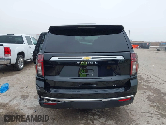 2021 Chevrolet Tahoe LT with VIN 1GNSCNKDXMR172381, listed as a IAAI auction lot 42168263 with 89,112 mi miles and . Bid and sale history available at DreamBid. Image 17.
