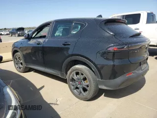 2023 Dodge Hornet GT with VIN ZACNDFAN2P3A05462, listed as a Copart auction lot 49036985 with 56,240 mi miles and Clean Title. Bid and sale history available at DreamBid. Image 2.