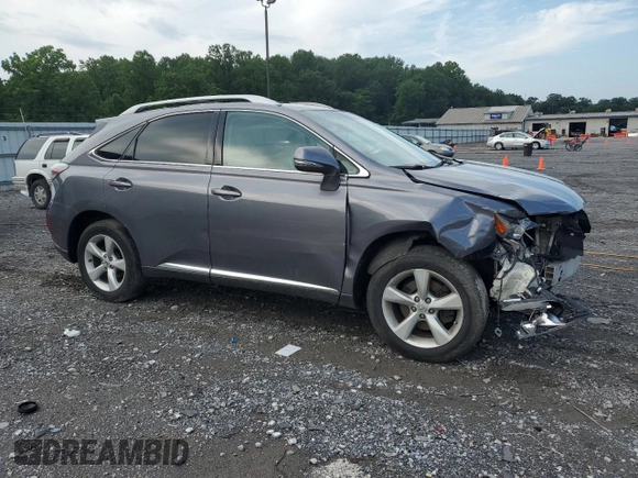 2012 Lexus RX 350 with VIN 2T2BK1BA5CC136824, listed as a Copart auction lot 63295785 with 133,803 mi miles and Salvage title. Bid and sale history available at DreamBid. Image 4.