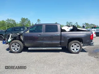 2014 Chevrolet Silverado 1500 LTZ with VIN 3GCUKSEC8EG536076, listed as a IAAI auction lot 41464408 with 133,418 mi miles and . Bid and sale history available at DreamBid. Image 14.