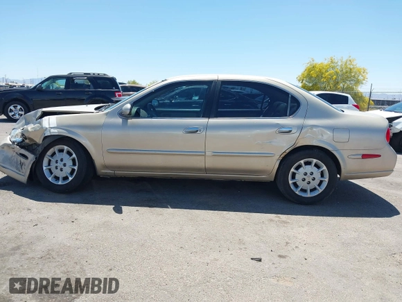 2000 Nissan Maxima GXE z VIN JN1CA31D0YT739248, wystawiony jako IAAI lot #42089086 z przebiegiem 140 979 mil mil oraz . Historia ofert i sprzedaży dostępna na DreamBid. Obrazek 14.