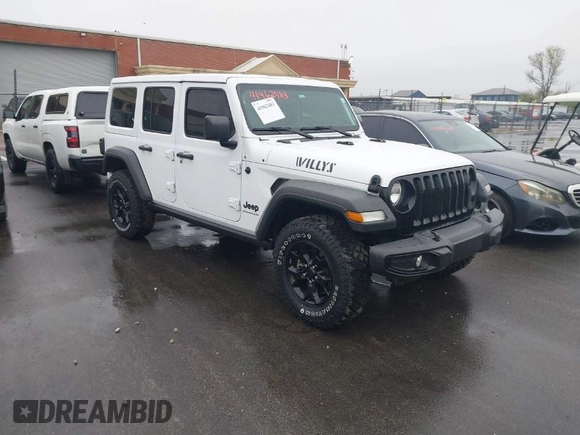 2023 Jeep Wrangler Sport with VIN 1C4HJXDN8PW523532, listed as a IAAI auction lot 41962483 with 14,643 mi miles and . Bid and sale history available at DreamBid. Image 1.