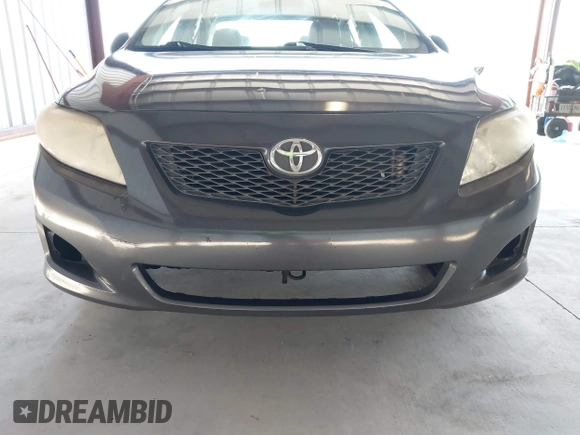 2009 Toyota Corolla with VIN JTDBL40E69J036916, listed as a IAAI auction lot 41776387 with 185,749 mi miles. Bid and sale history available at carsss.com. Image 6.